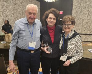 Betsy VerPlank-Kerl congratulated by her parents, Joel and Susan VerPlank.
